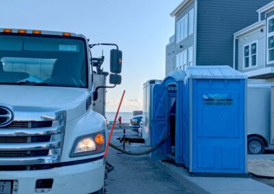 Our Arnold's Environmental team member is seen cleaning a Basic Portable Restroom at a construction job site. #Where'sArnold