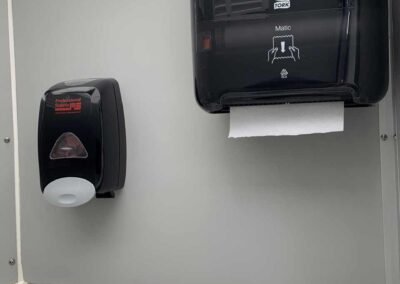 Our Crystal Concept Flushable Portable Restroom is also stocked with soap and paper towels.