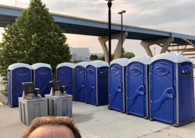 A forehead selfie in front of our Weekender Portable Restrooms and 2-Sided Hand Wash Stations. #ForeheadSelfie