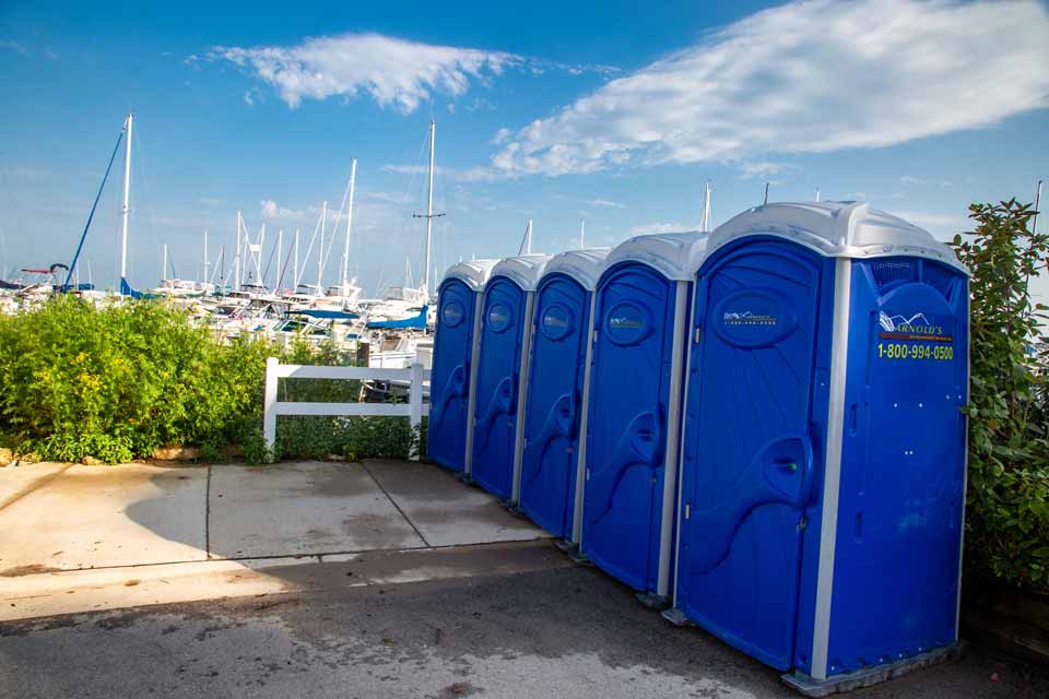 The Weekender Portable Restroom by a boating dock. #WheresArnolds