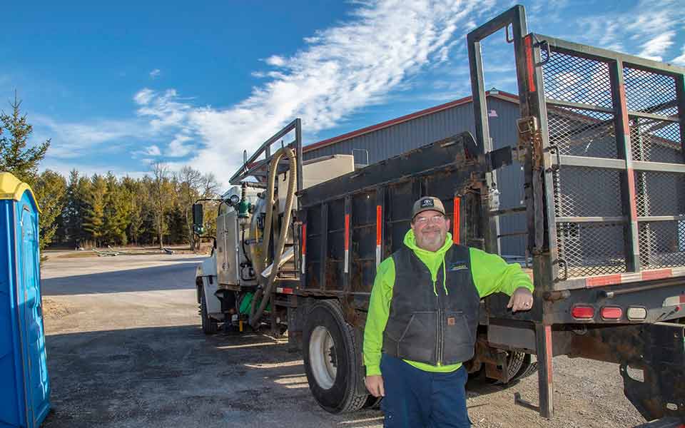 Portable Restroom Truck Driver smiling Portable Restroom Truck Driver smiling